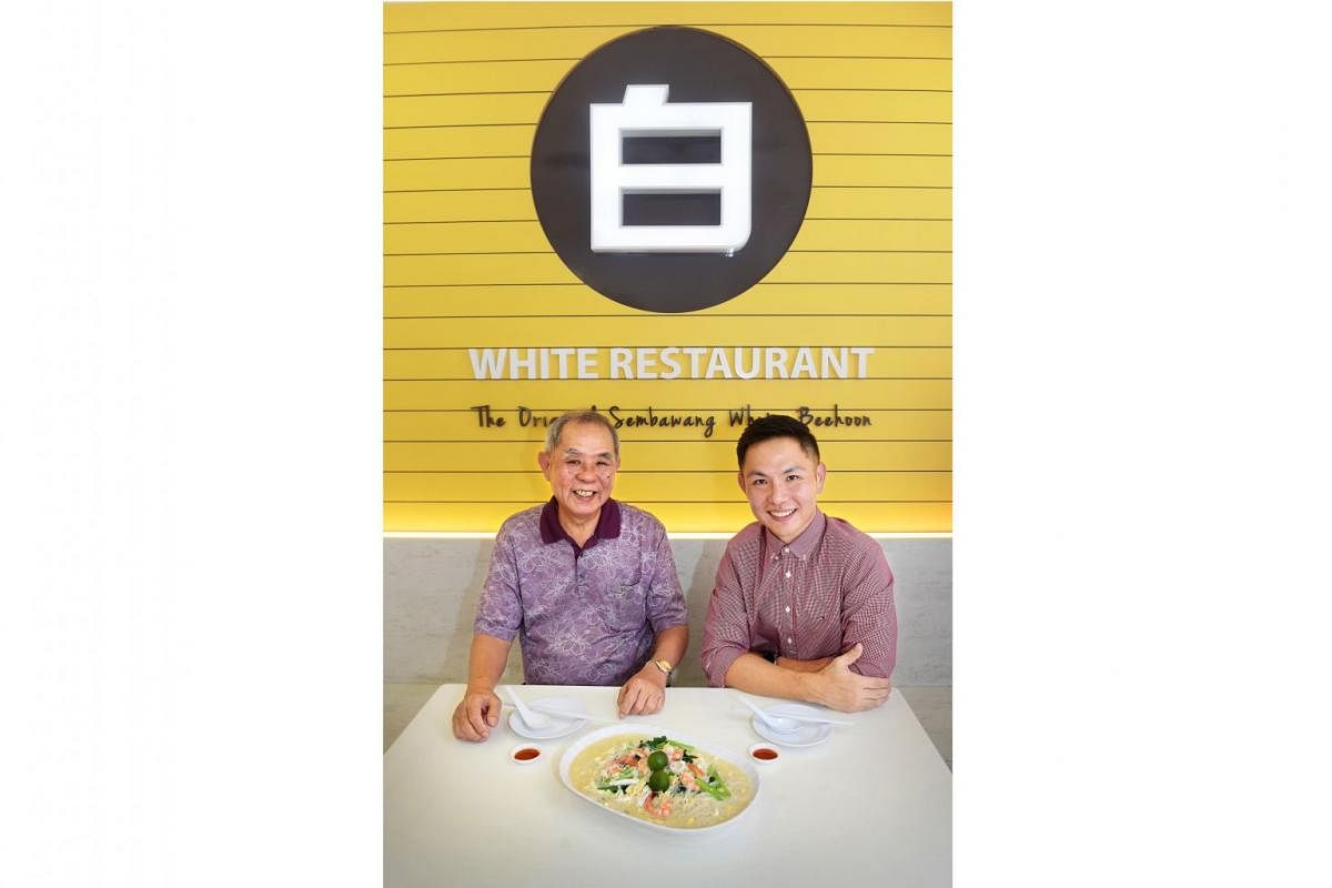 Mr Tay King Huak and his son Victor with their famous white beehoon dish. 