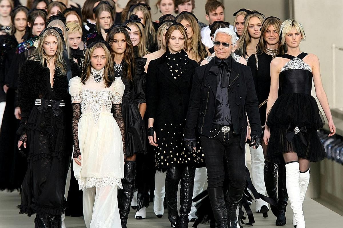 Karl Lagerfeld at the Fall/Winter 2006/2007 ready-to-wear Chanel collection in Paris. The designer reinvented the iconic brand which was struggling after the death of founder Coco Chanel.