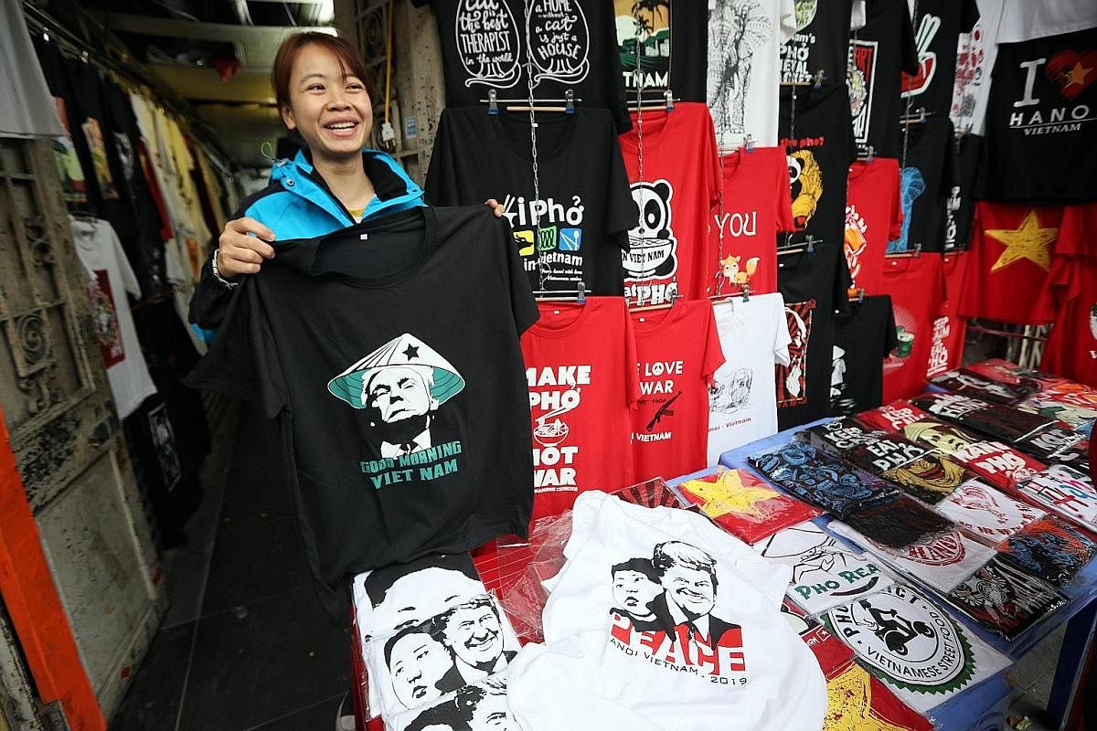 A bar in Hanoi has a cocktail commemorating the US-North Korea summit. T-shirts with the images of US President Donald Trump and North Korean leader Kim Jong Un at a store in Hanoi.