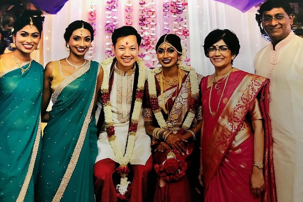 Mrs Sarojini Padmanathan and her husband T. Padmanathan with their daughters (from far left) Uma, Bhaama and Hema and son-in-law Daryl Cheng in 2016. She says the focus on academics is not new.