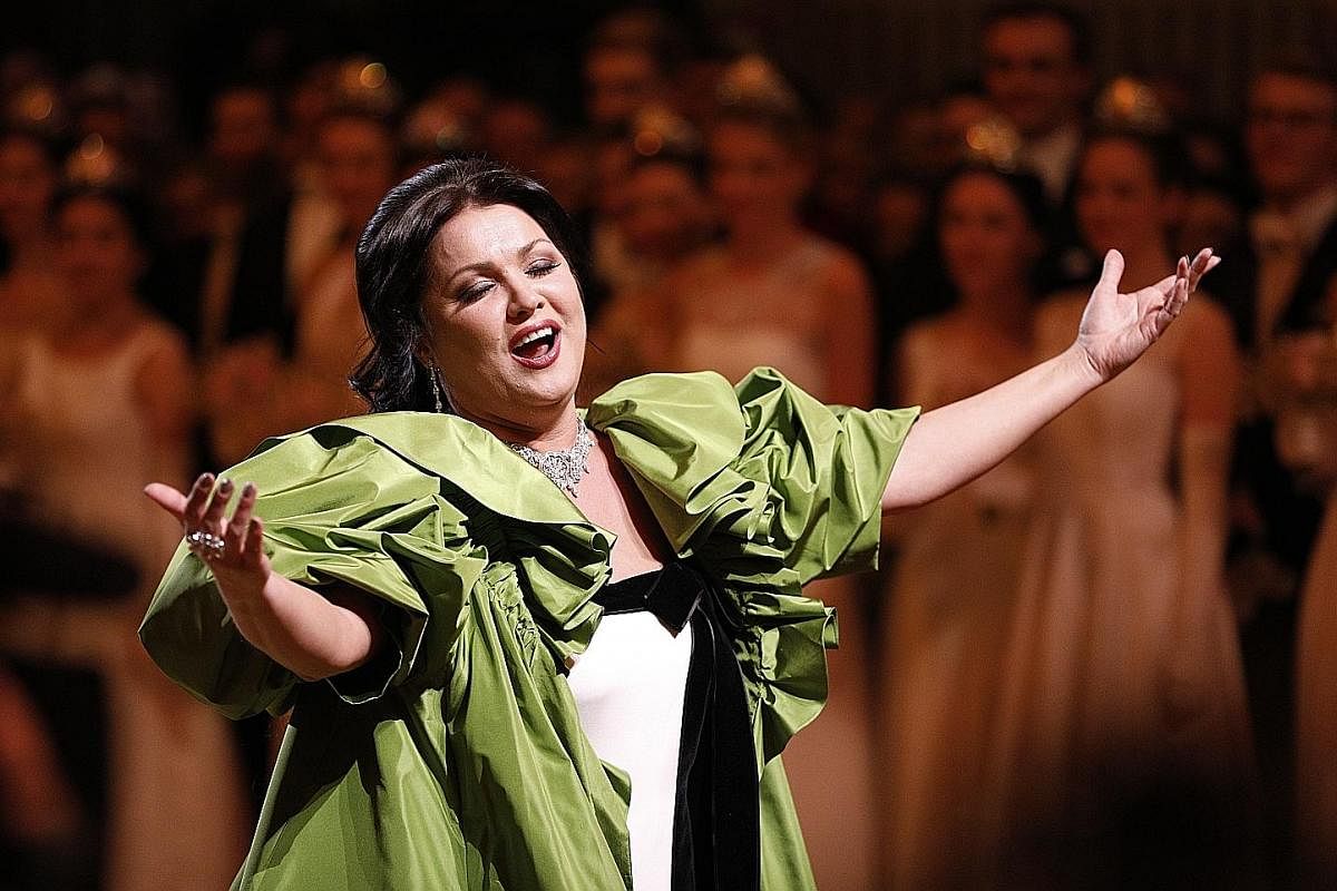 Russian-Austrian soprano Anna Netrebko (above) and dancers of the State Opera Ballet performing during the opening ceremony at the State Opera.