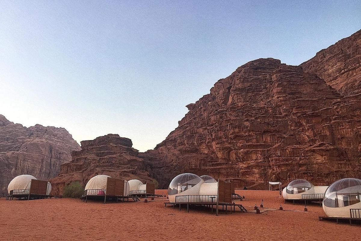 Spending the night in a bubble tent lets guests sleep under the stars while still enjoying creature comforts, like a bathroom and air-conditioning.