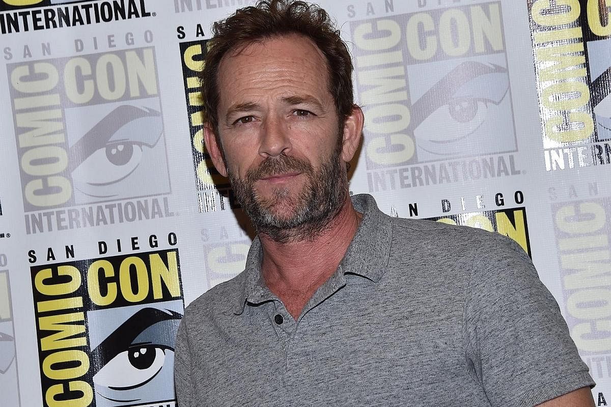 A severe headache could be a symptom of a haemorrhagic stroke. Mr Ben Goi, the son of Singapore's Popiah King, and actor Luke Perry (above) died of a stroke at the ages of 43 and 52 respectively.