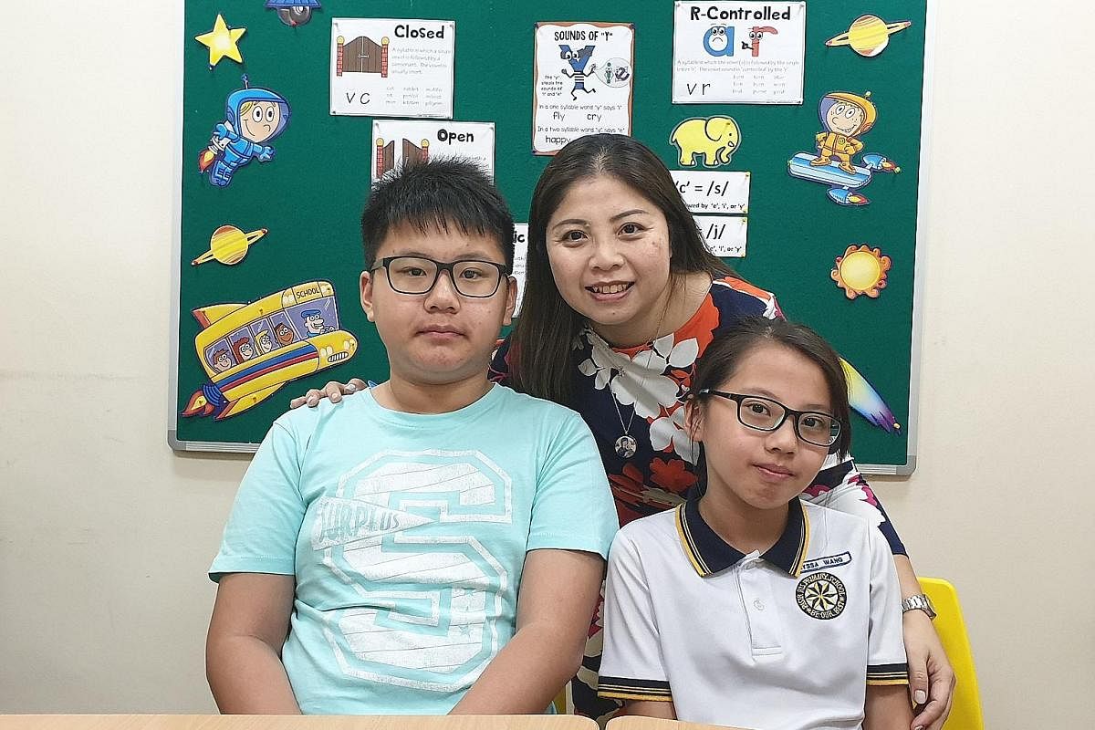Ms Doreen Fong tells her two dyslexic children - Zachary and Alyssa Wang - that a good attitude is more important than good grades.