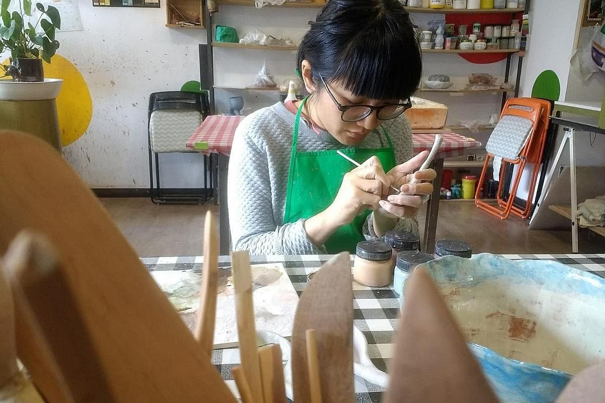 Educator Georgiana Phua at a ceramics class in Madrid, Spain, during her sabbatical early this year. While there, she will also be brushing up on her Spanish and and learning user-experience design.