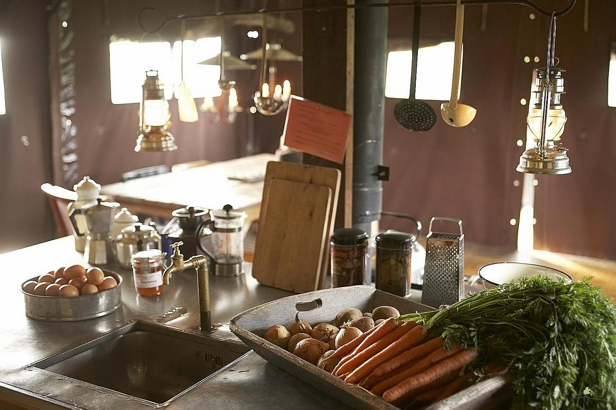 Cooking on a wood-fired stove can be a challenge, but all the produce is fresh off the farms.