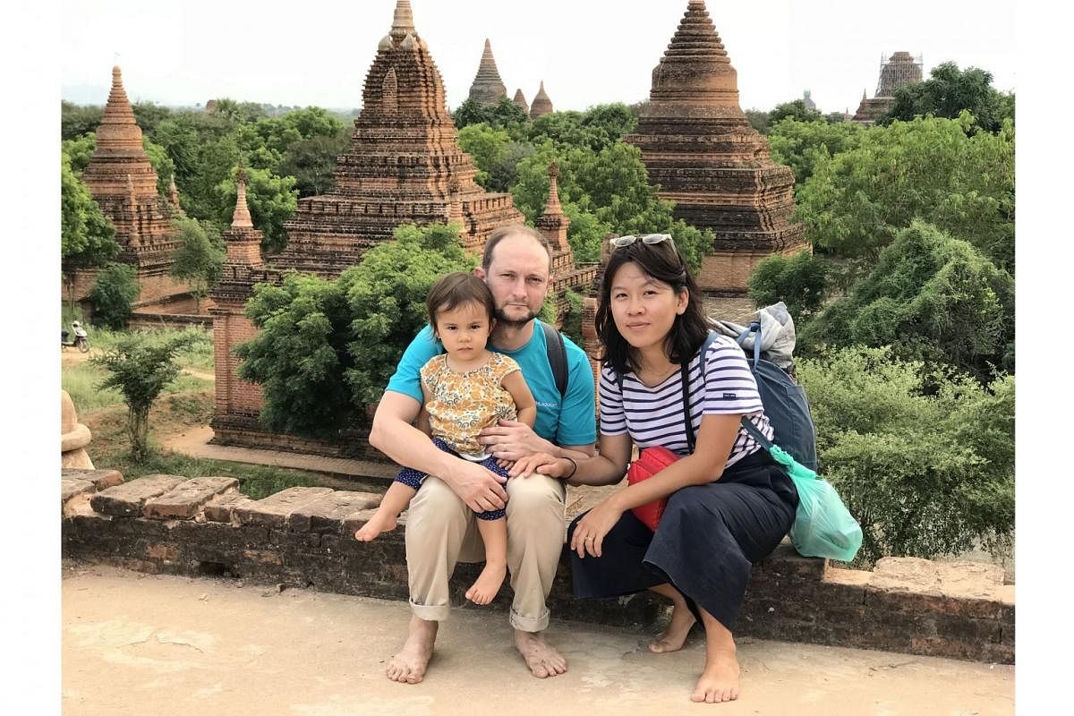 The writer, her husband and their daughter, Elna, two, in Bagan.