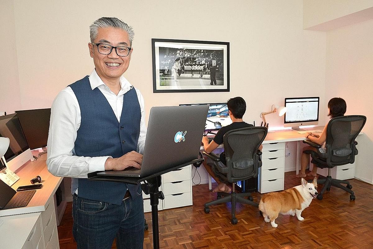 Mr Air Vongxayasy, director of operations of the customer-experience department at American tech company Cisco, shares his home office space with his son and his wife.
