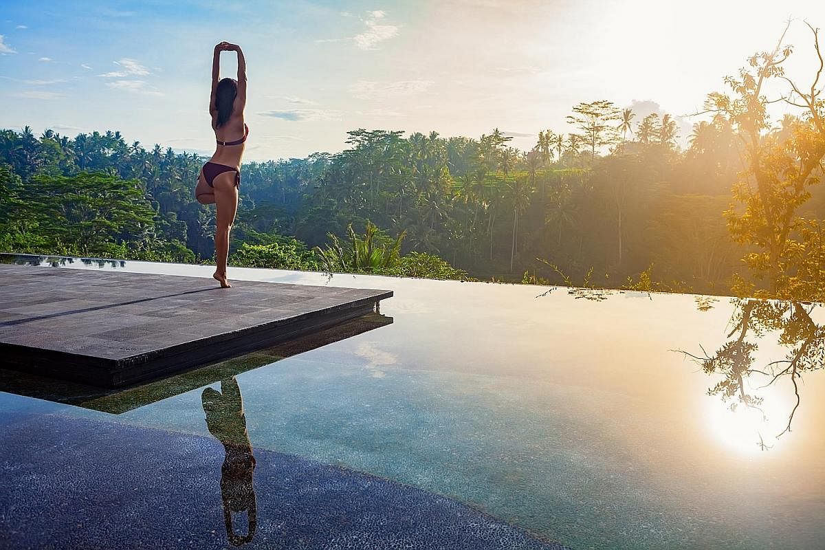 Wellness retreats often include yoga and meditation at sunrise.