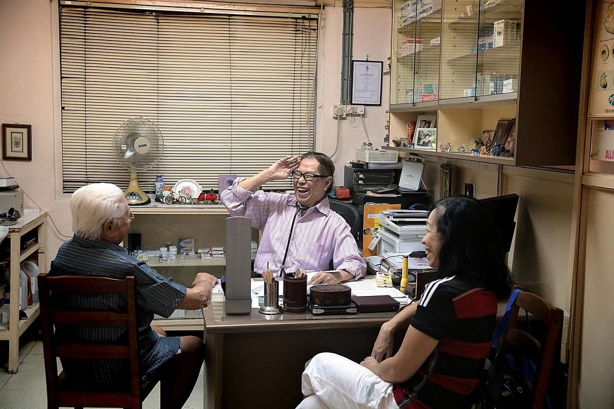 Patients (above) at Meng's Clinic last week. The clinic's reception is manned by Madam Doreen Tan (below), who is in her 70s. She has worked there for over 30 years and knows almost all the patients by name. Dr Chan and his wife of 15 years, Madam Sa