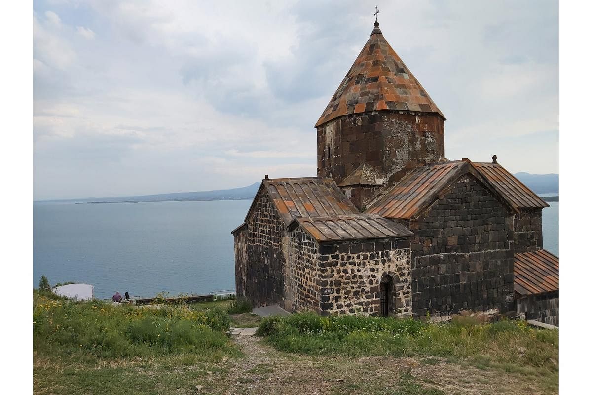 Part of the Geghard monastery in Armenia is carved out of the adjacent mountain and the Sevanavank Monastery (above) overlooks Lake Sevan.