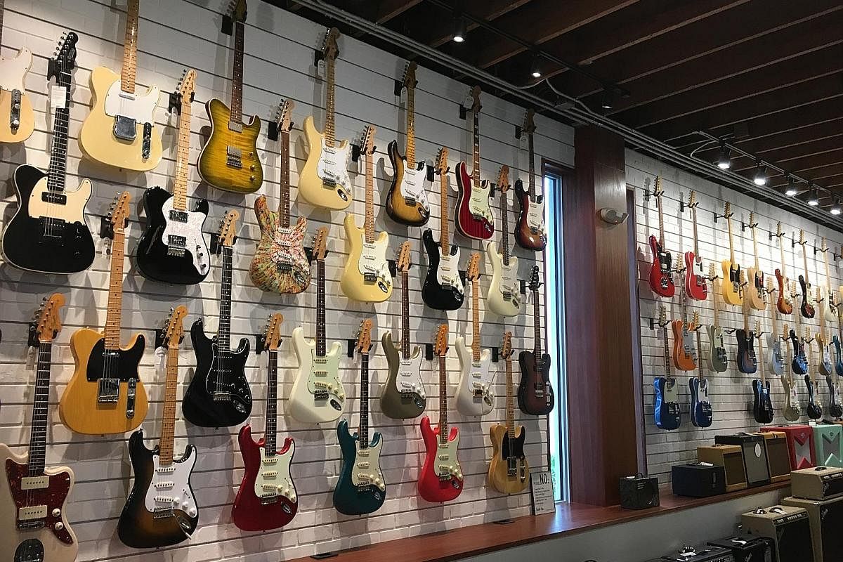 At Walt Grace Vintage, rare guitars line the walls of the space.