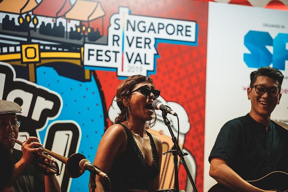 Local band MMLD performing on Saturday at the Singapore River Festival.