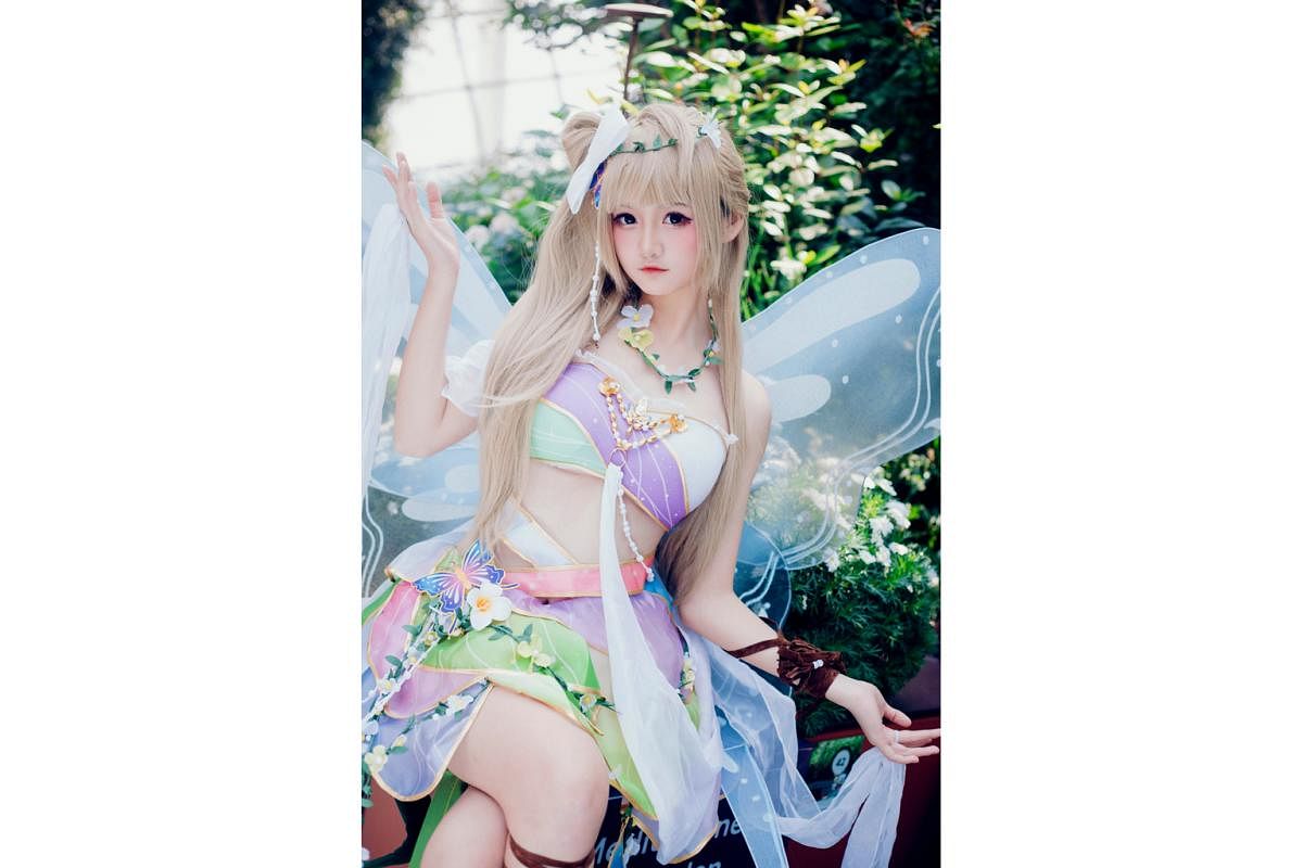 Zhen Zhen, also known as Yukiko, is dressed as Kotori Minami from Japanese multimedia project Love Live! She is not a full-time cosplayer but sells her cosplay photos and merchandise on crowd-funding members platform Patreon. 