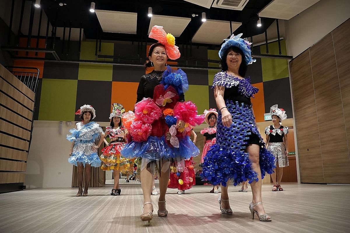 Madam Lily Yap (front, left) and Madam Annie Phua (front, right) during a full-dress rehearsal for the Aug 18 fashion show. Through a modelling interest group, the members have created a support network for themselves.