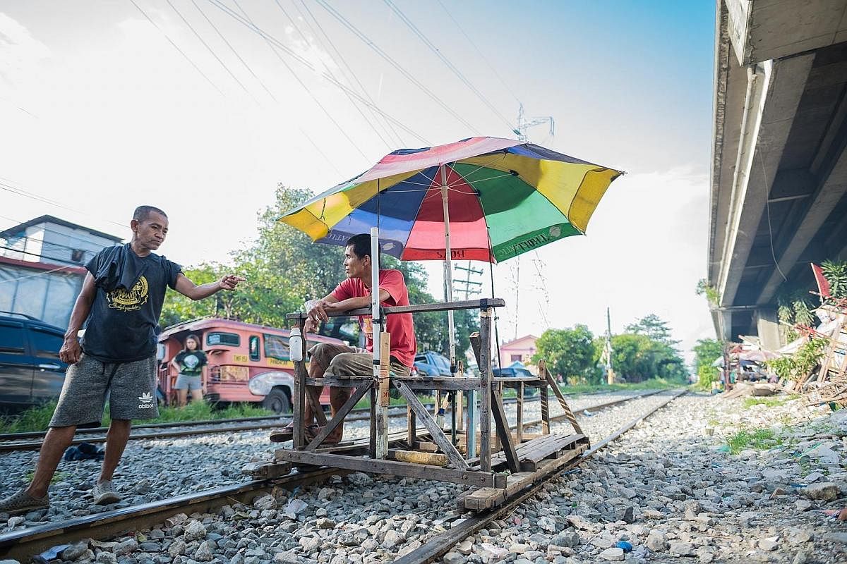 Left: Mr Benjie Barbosa, 35, pushed his first trolley in 1999, when he was just 15. He did it for five years, quit to become a farmer but was back pushing trolleys again in 2017. Right: Most trolley boys have never gone past sixth grade. Pushing trol