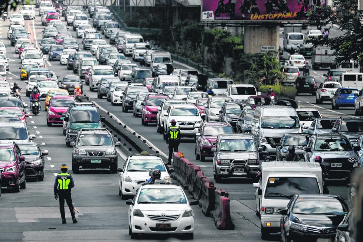 Heavy traffic in Makati City, south of Manila. Most people living in the Philippine capital spend a quarter of their waking life stuck in traffic caused by a creaking network of inadequate roads, highways and mass transit systems.