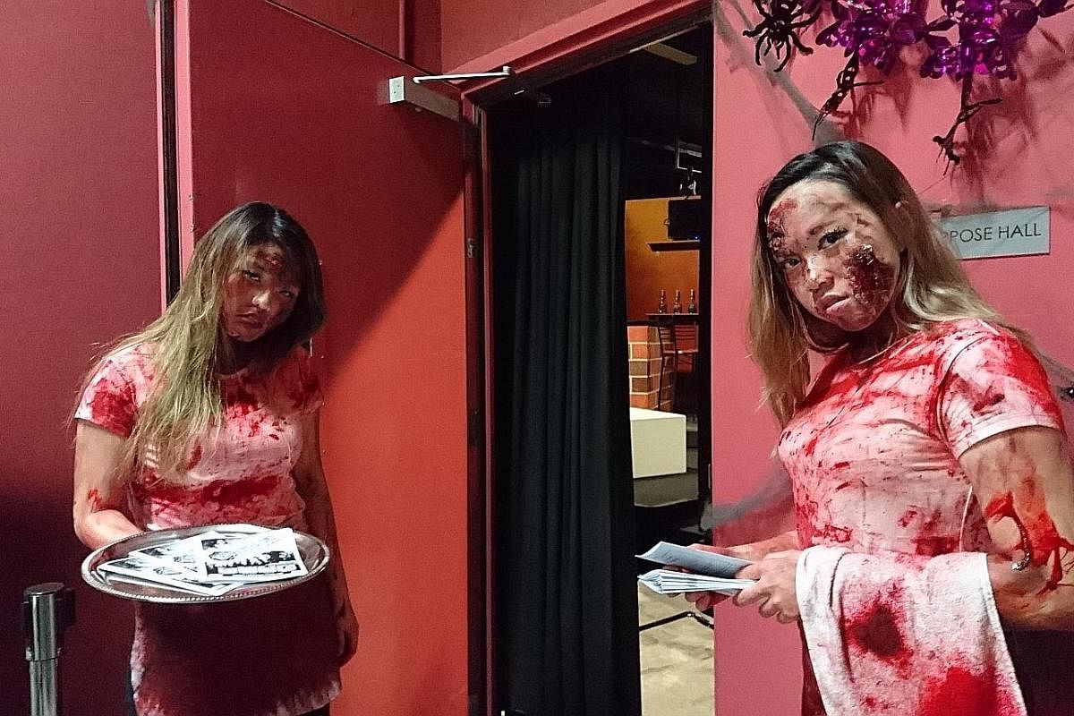 L'Arietta Singapore had "zombie" ushers greet theatregoers at its 2016 production Operacalypse Now (above), and its family-friendly staging of Alice In Wonderland (right) last year boasted a bouncy castle and attracted 80 per cent attendance over fiv