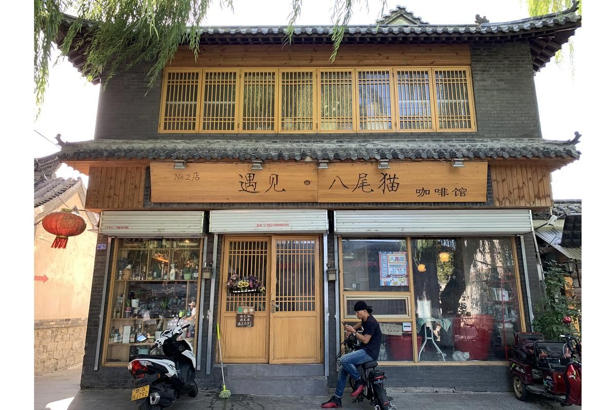 In Jinan, a hipster cat cafe favoured by artsy millennials sits by a spring-fed canal in Qushuiting Street.
