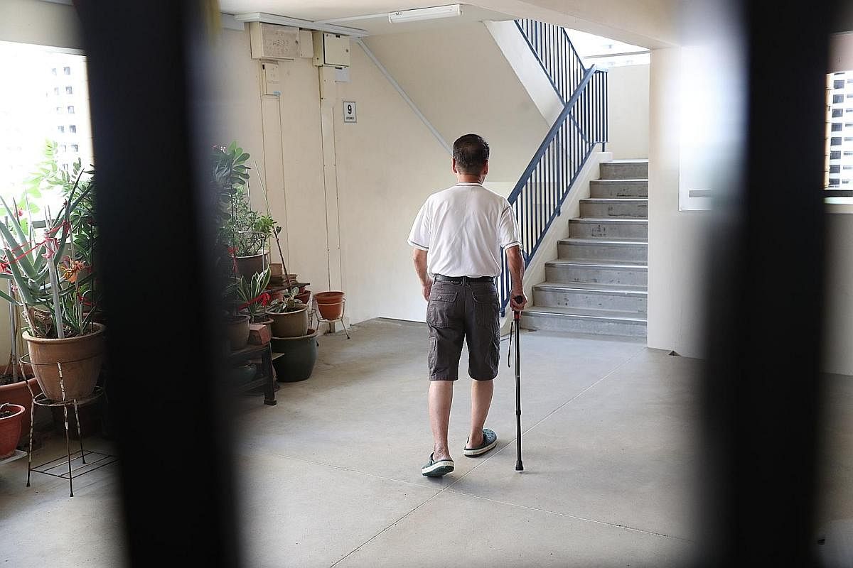 Mr Chua Wah Nam, 71, who lives in a four-room flat in Block 712 Jurong West Street 71, walks with a limp after knee surgery six years ago. He relies on a walking stick to climb down two flights of stairs to get to the nearest lift landing in his bloc