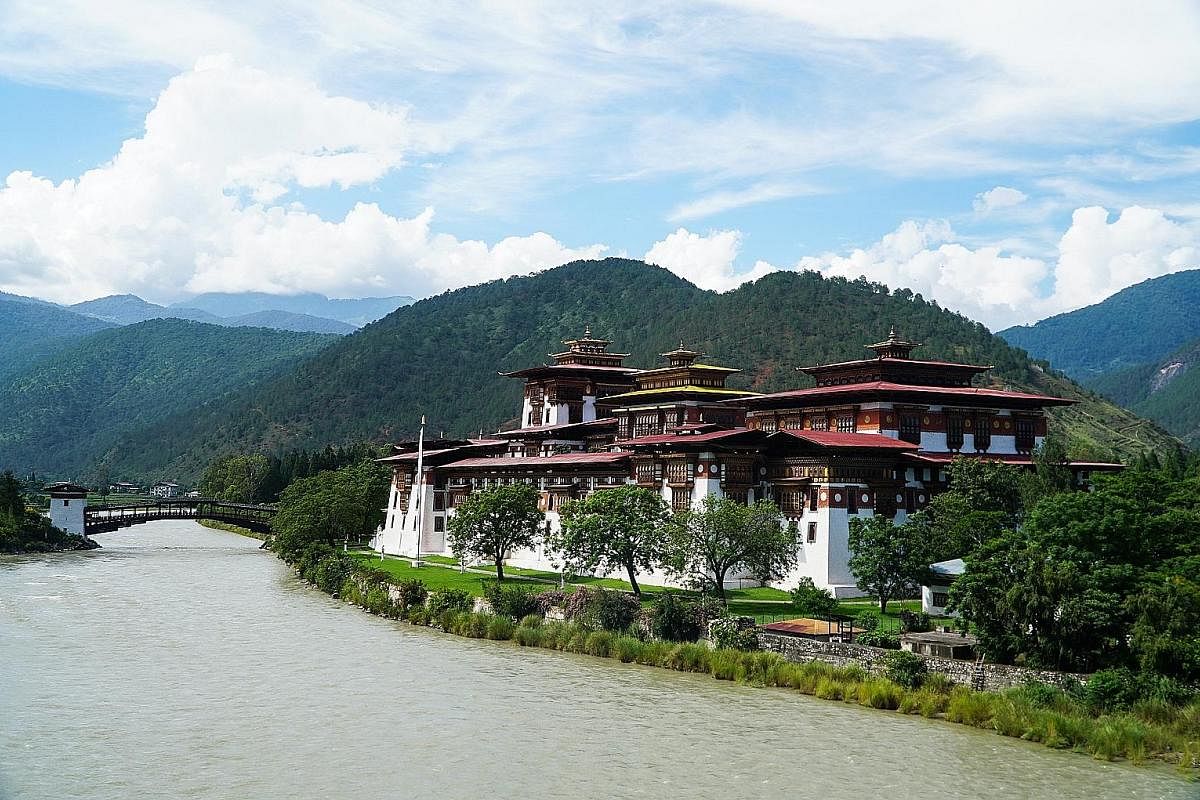 Punakha Dzong rises impressively from the banks of the Pho Chu and Mo Chu rivers. 