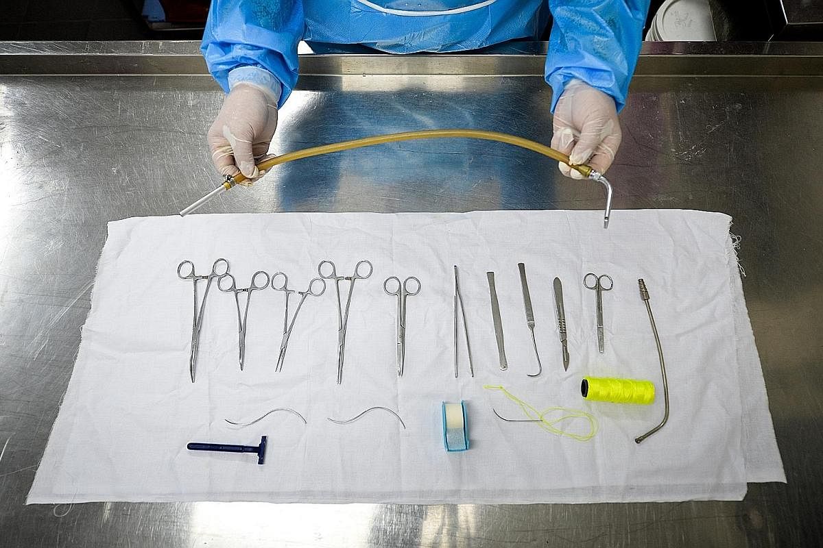 Some embalmers do restorative work on bodies that have been badly injured, such as in accidents and suicides. There are about 30 embalmers here. Some of the tools used in embalming. Besides pumping the embalming fluid into the deceased, embalmers als