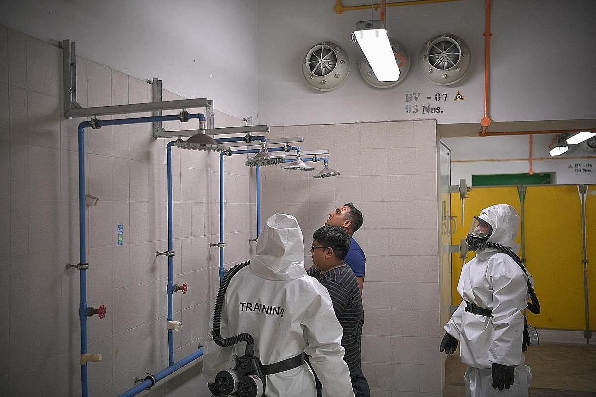 There are shower facilities at the decontamination chamber for anyone exposed to hazardous materials.