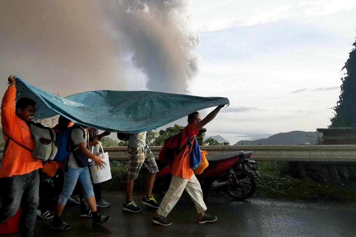 In Pictures: Thousands Evacuated After Taal Volcano In Philippines ...