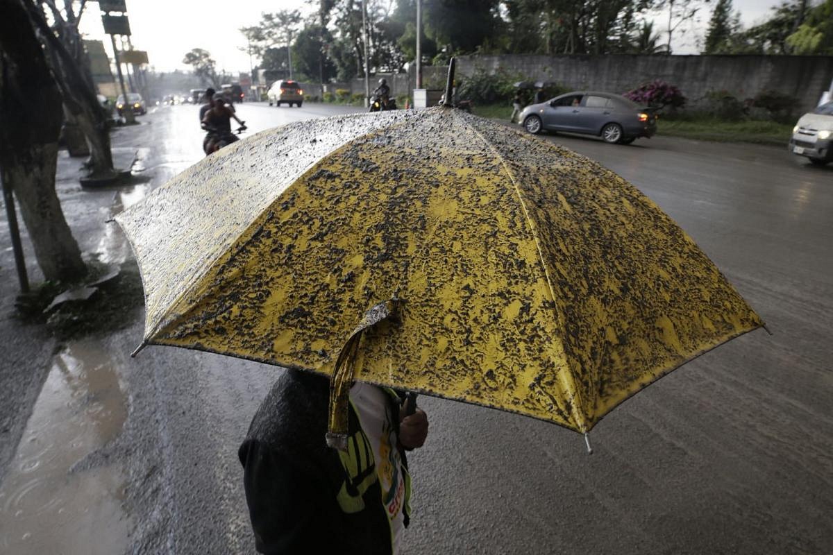 In Pictures: Thousands Evacuated After Taal Volcano In Philippines ...