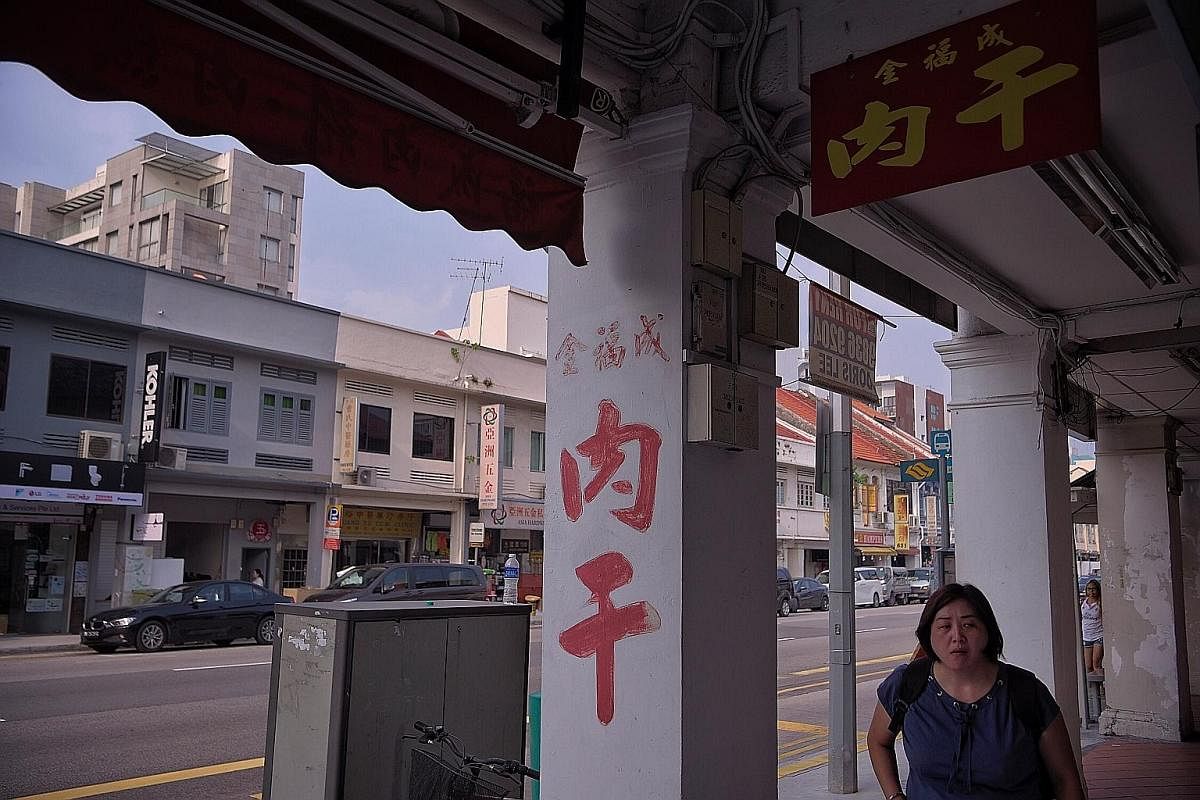 In the run-up to Chinese New Year, the wall of Mr Ong's shop is plastered with orders. It is an organised system that corresponds to the date of collection. The paint may be fading, but the scent of Mr Ong Geok Hoo's barbecued meat is strong. Kim Hoc
