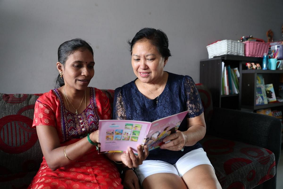 Madam Margaret Chew Siew Lan, 65, is learning Tamil from her neighbour Hemalatha Ramesh, who is also the founder of Singa Academy, which has Tamil classes for children and adults.