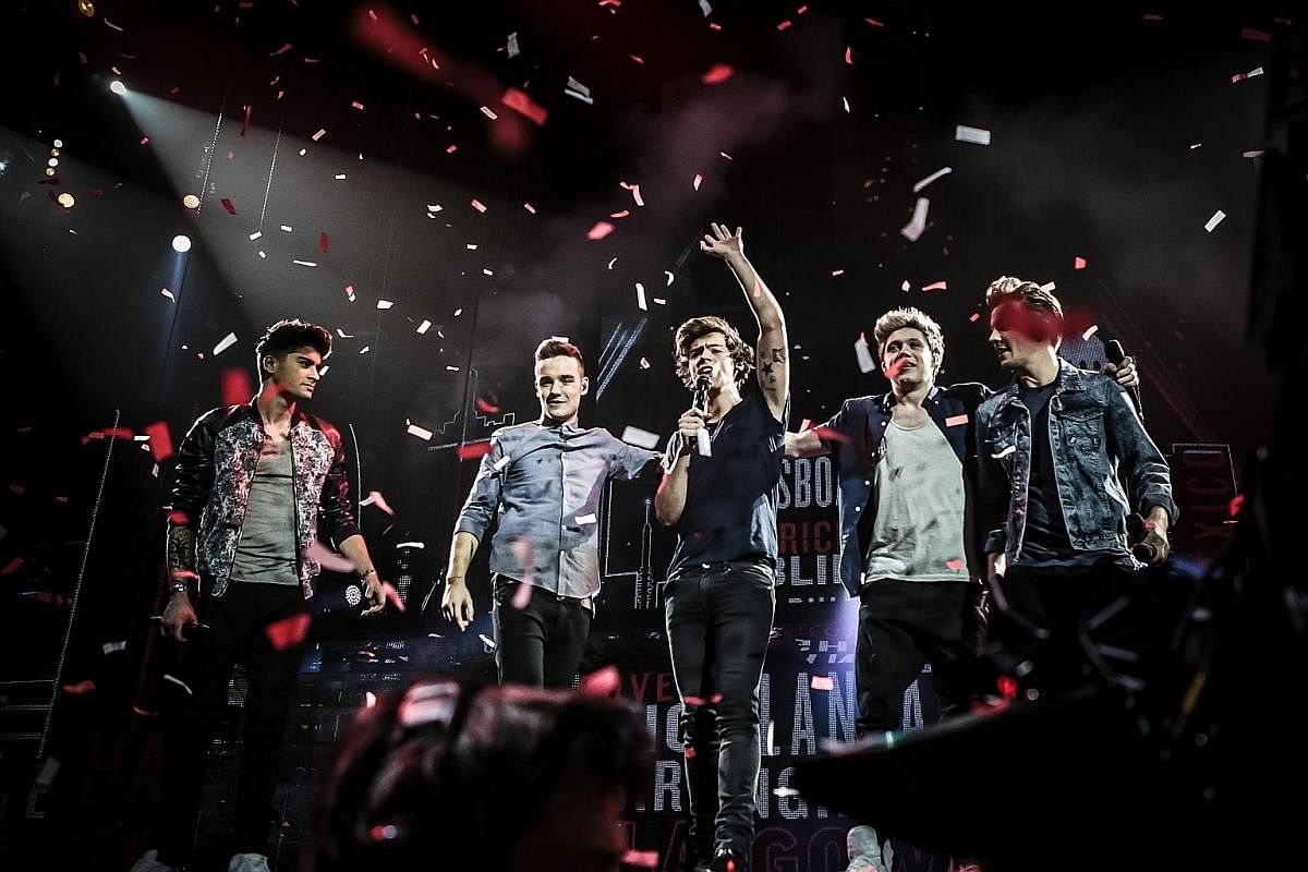 Band members (above, from left) Zayn Malik, Liam Payne, Harry Styles, Niall Horan and Louis Tomlinson in a still from the 2013 movie, One Direction: This Is Us, which followed the band on their world tour.