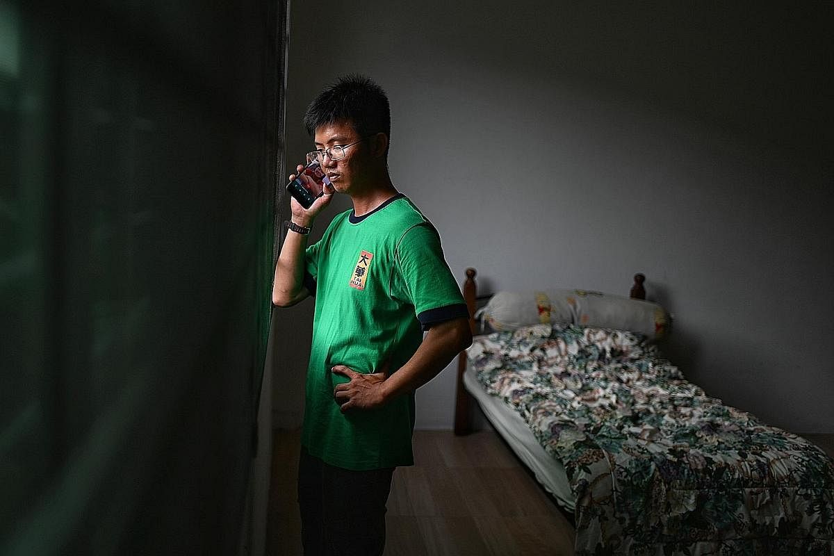 "When I handed my passport to (the) immigration officer, my hand was shaking," recalled Madam Nelly Hamdin, 45, as she recounted the day - March 17, a day before the lockdown - when she left her family behind in Malaysia. "My youngest son held onto m