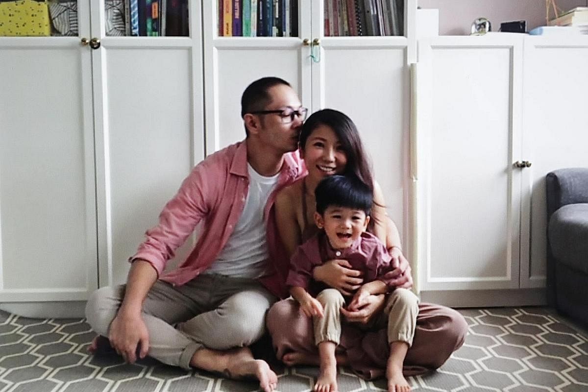 Commercial photographer and film director Nicky Loh and his wife Vivi, with their two-year-old son Nathan. This photograph was shot during a Zoom call. ST PHOTO: NEO XIAOBIN