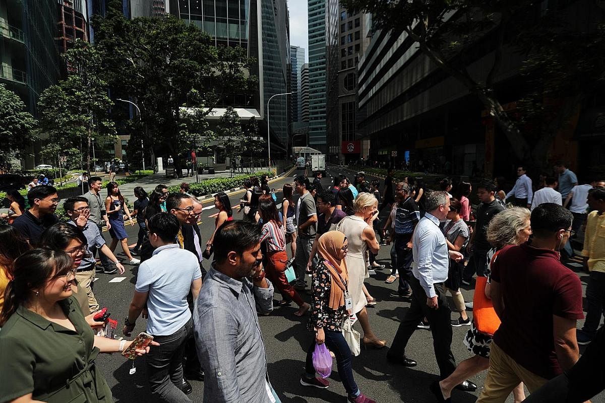 The lunch crowd in the CBD in January. For a nation that needs to be a global city to remain relevant, and also a home for Singaporeans, the balance between foreign professionals and the Singaporean core will perhaps always be tough to strike.