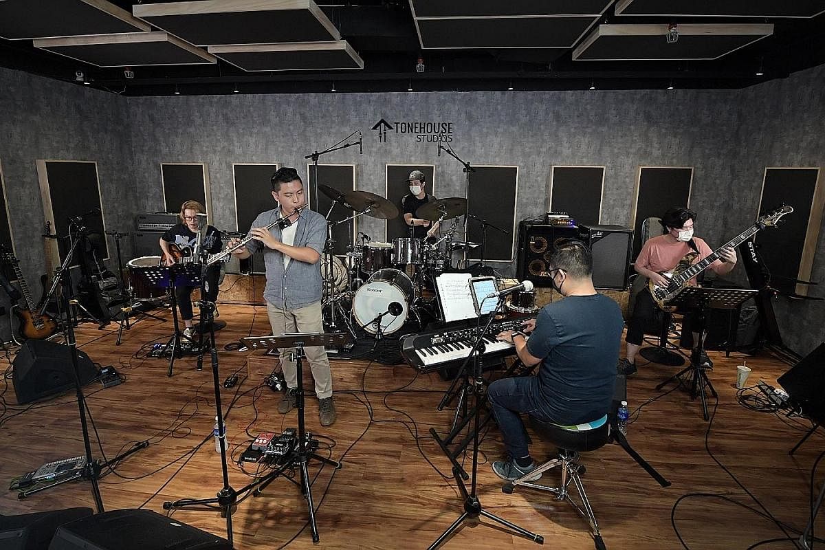 Local jazz musicians (above, from far left) Sebastian Ho, Rit Xu, Teo Jia Rong, Jordan Wei and Ben Poh doing a live-stream performance at music studio Tonehouse on Monday.