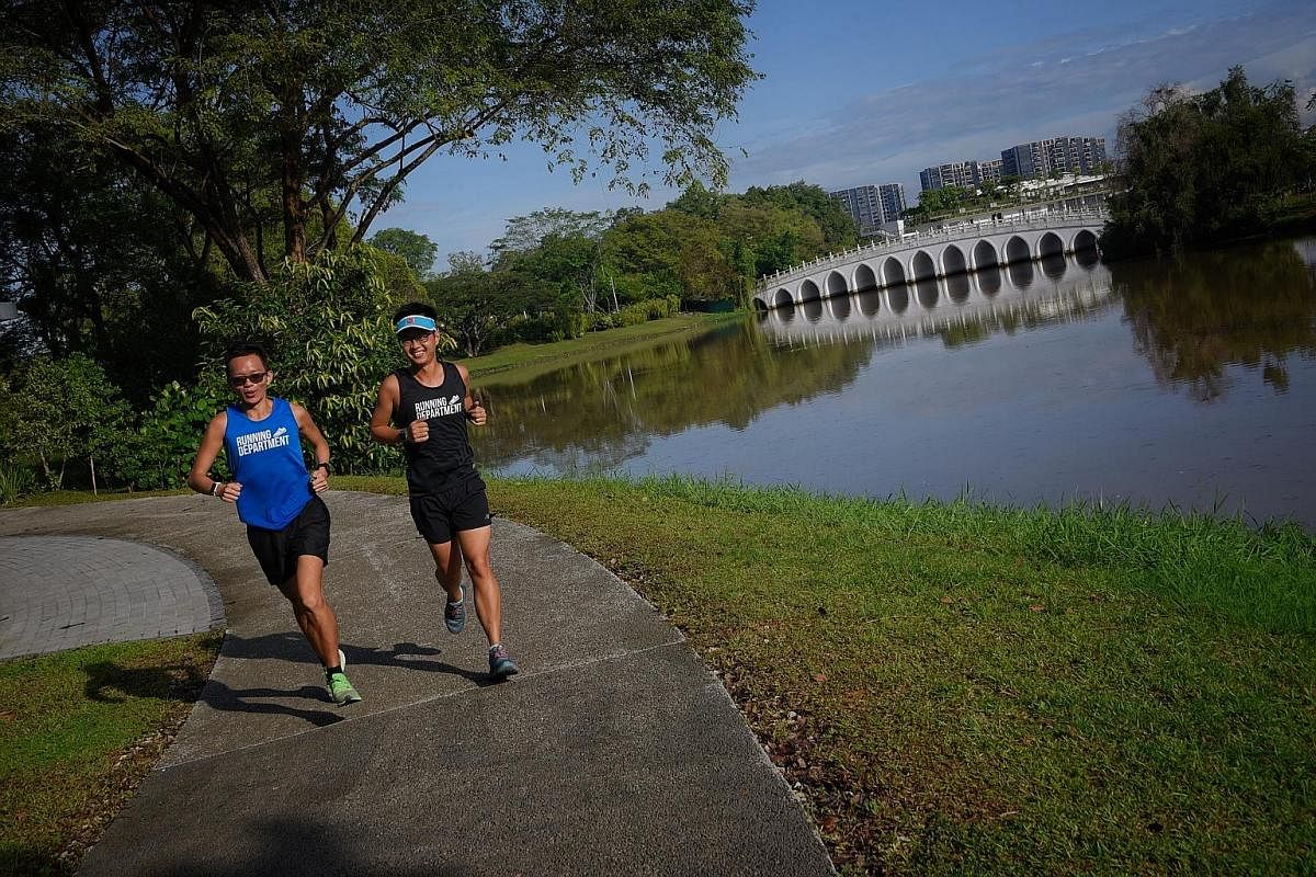 The White Rainbow Bridge at Jurong Lake (background) is among the scenic spots in a Culture Shapers route by the Ironman Group and Singapore Tourism Board, as part of the Standard Chartered Singapore Marathon.