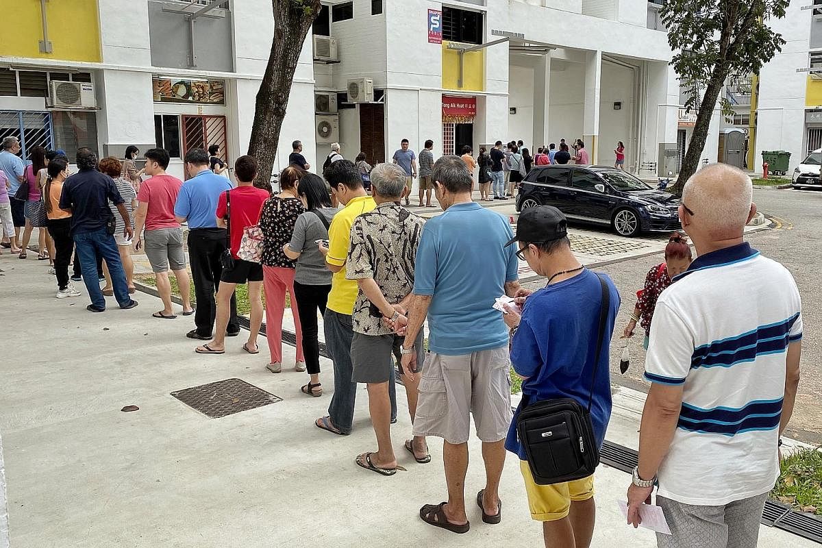People queueing in Hougang for a shot at the $12 million prize pool in this year's Toto Hong Bao Draw in February. There is nothing wrong in placing small bets once in a while to see if Lady Luck will pay you a visit one day, says the writer, but a l