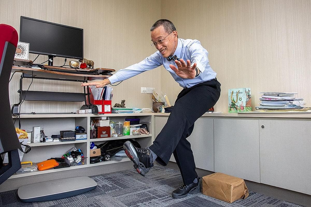 Sengkang General Hospital chief executive Christopher Cheng challenged himself to do the single-leg, sit-to-stand exercise this year.