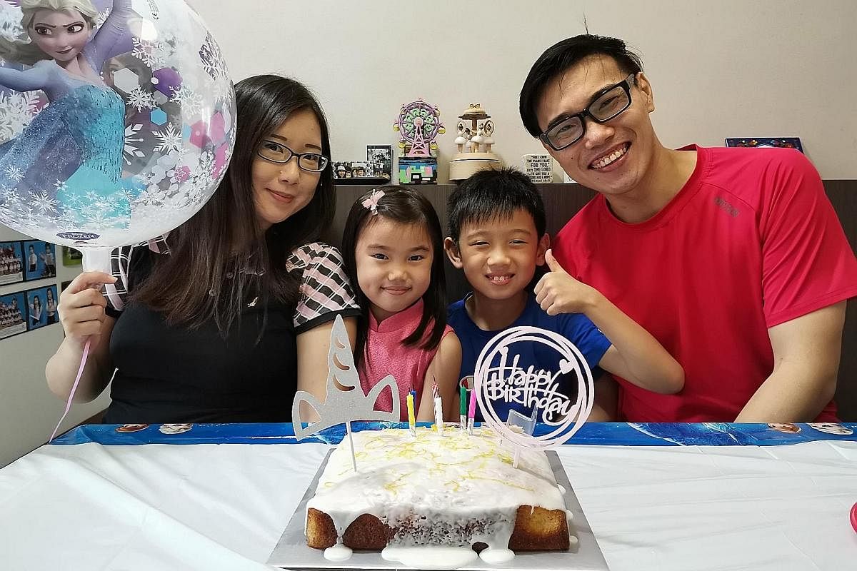Mr Shawn Quek, manager for School Engagement and Outreach at the Centre for Fathering, with his wife, Ms Joni Ang, and their children - Raphael, eight, and Avalyn, six.