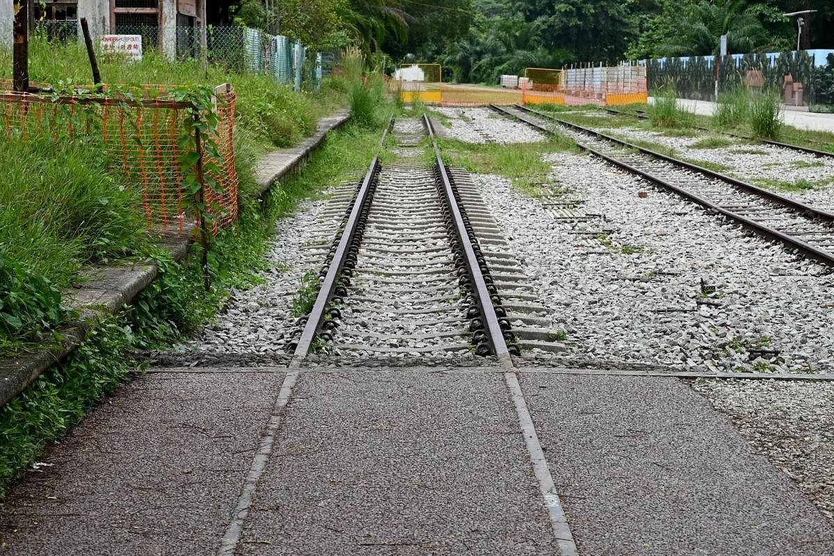 The Bukit Timah Railway Station and its old tracks. Originally constructed as a small station to serve the suburban parts of Singapore, this single-storey building follows the style of traditional small-town stations common in the United Kingdom and 