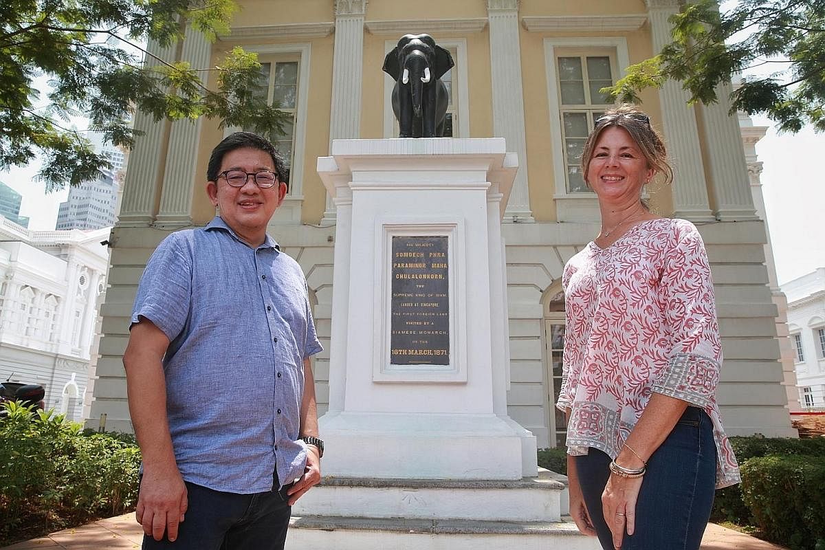 Secret Singapore's (above) authors Jerome Lim (top left) and Heidi Sarna (top right) in front of the elephant statue at Old Parliament House.