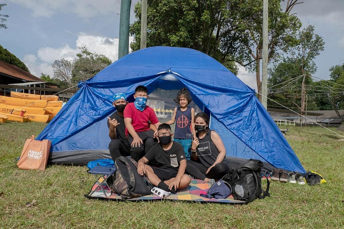 Travel agency SGTrek conducts "camp-cations" at a private campsite in Sembawang where participants can learn basic survival skills such as how to pitch a tent, cook in the outdoors and start a fire. Since campsites reopened this year, Mrs Dixie Chin 