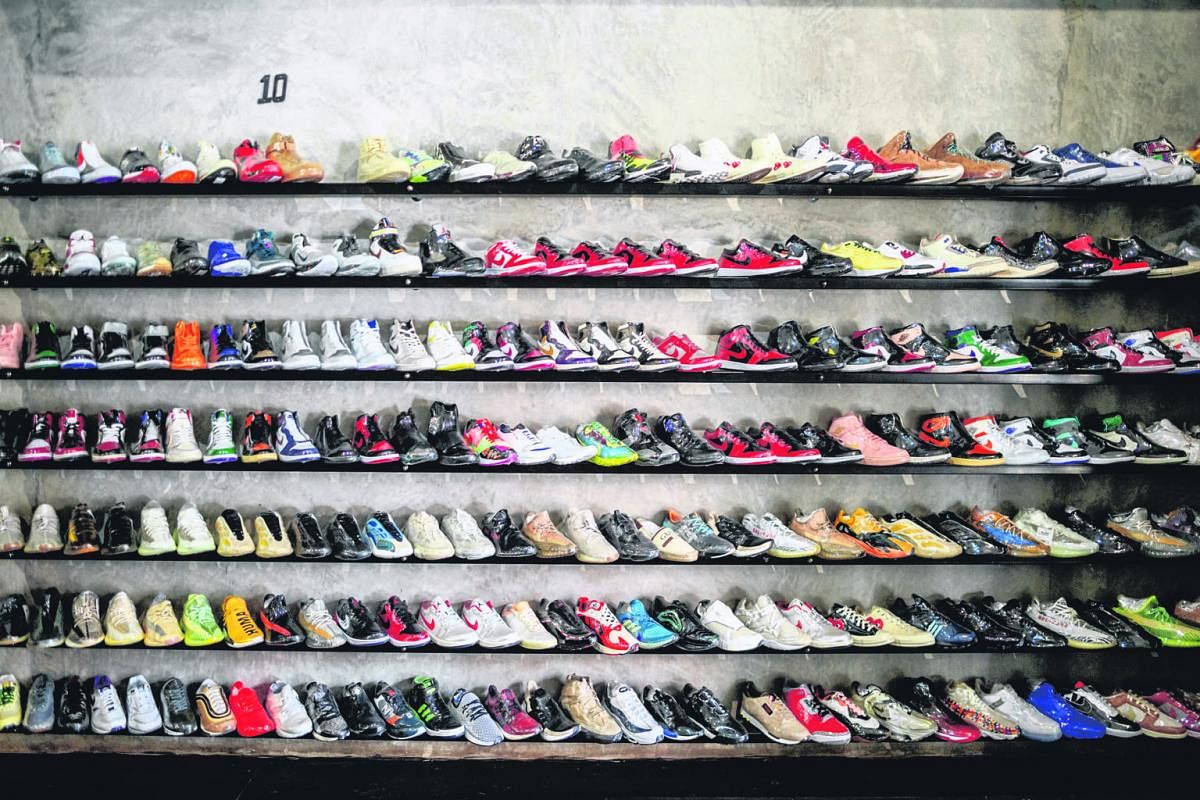 Sneakers are more than just shoes for hip South Africa city dwellers. At vintage sneakers reseller shop Court Order (top), a popular haunt for collectors of sneakers, there are myriad designs (above left) to choose from as well as a sneaker laundry (