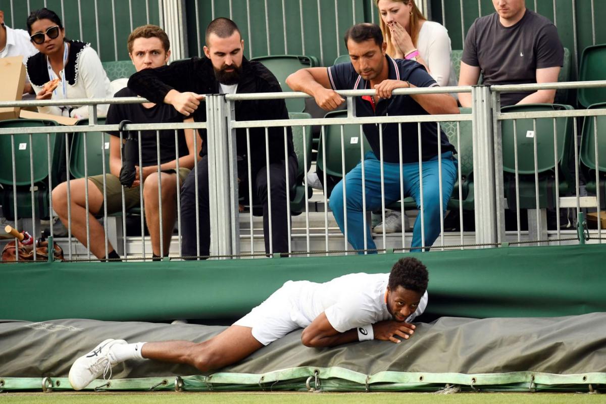 In Pictures Slippery Wimbledon courts sends players tumbling The