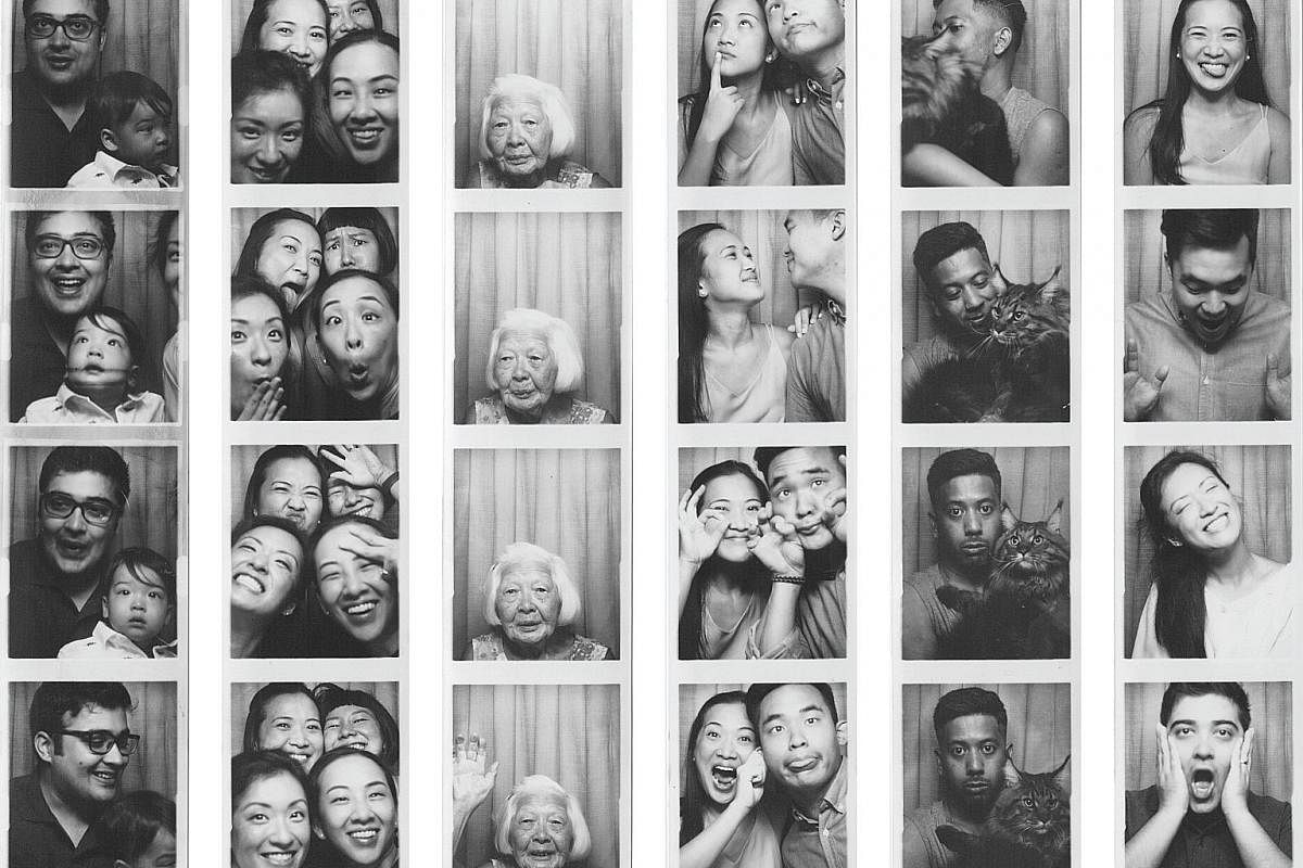 Ms Thea Tan and Mr Afiq Safwan Adly (both right) brought in a discarded analogue photo booth from San Diego last year and now lease it out at The Projector. Novelty meets nostalgia with these black-and-white photos taken at Fotoautomat's vintage anal
