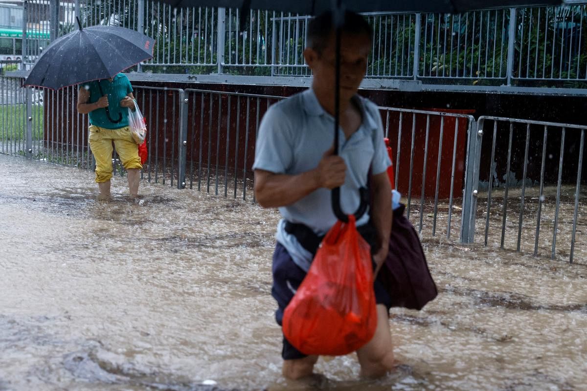 In Pictures: Hong Kong inundated by flooding after torrential rain ...