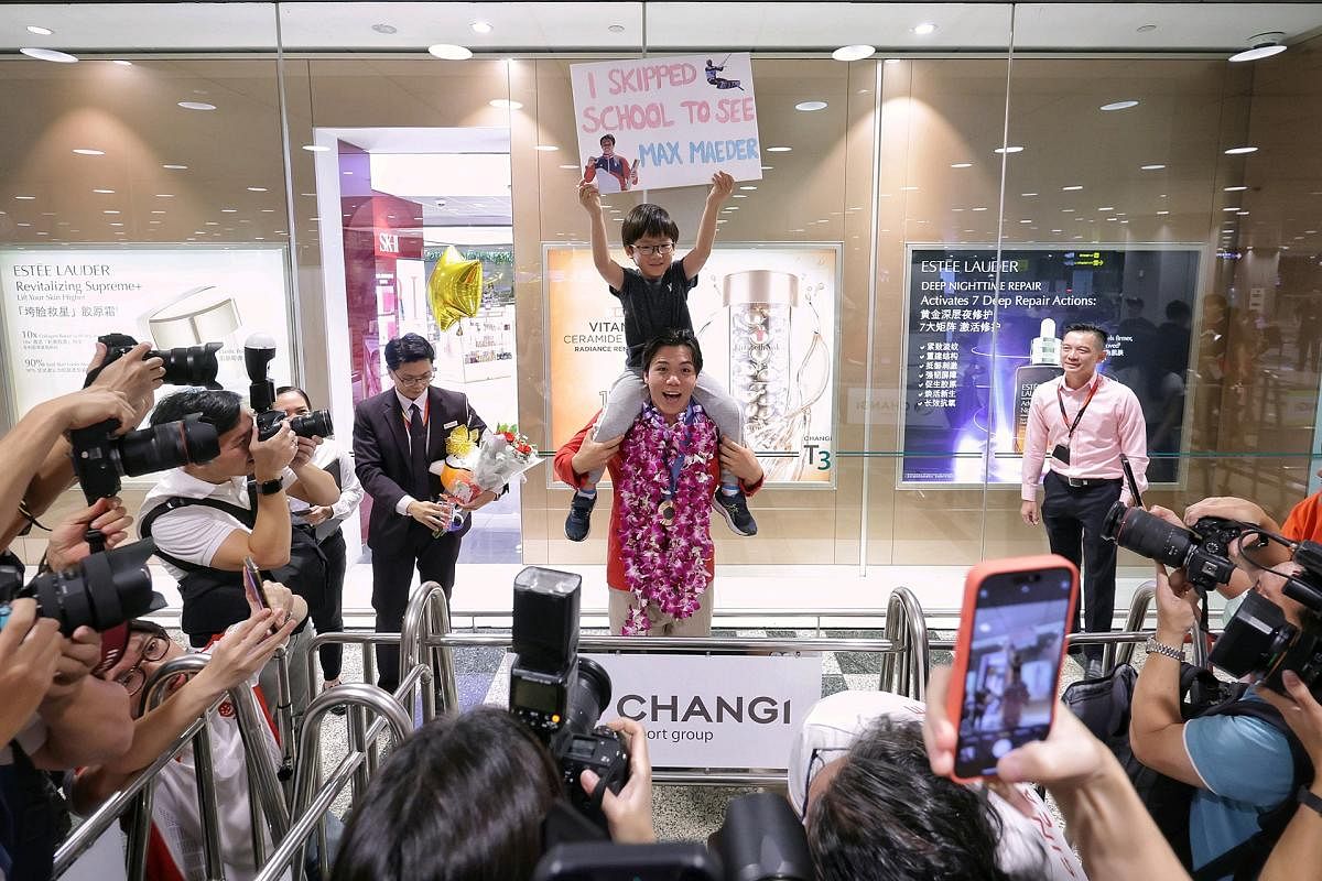 In Pictures: S’pore’s Olympic bronze medallist Max Maeder returns home